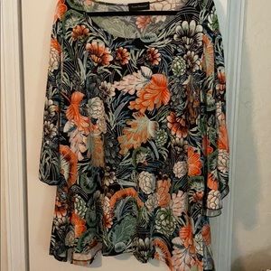 Plus size top by Travel Elements.
